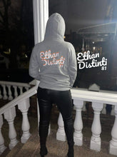 Load image into Gallery viewer, Logo Art.2 - Coll #1- Unisex Hoodie *Avail in 4 colors *Note This Hoodie "RUN SMALL" Please Order A Size Bigger Than Your Normal Size.